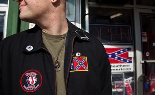 LAURENS, SC - DECEMBER 5: An American Nazi Party member gathers during a white-supremacist event outside the Redneck Shop December 5, 2009 in Laurens, South Carolina. The American Nazi Party & International Knights of the Ku Klux Klan held their 7th annual White Unity Christmas Party which was publicized as a family event. Richard Ellis/Getty Images/AFP