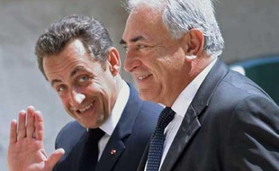 Dominique Strauss-Kahn et Nicolas Sarkozy, le 14 juillet 2007, à Paris.
