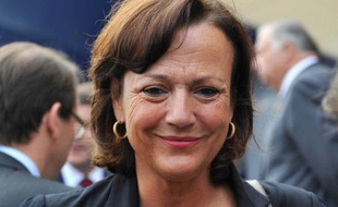 Florence Woerth, l'épouse d'Eric Woerth, lors du défilé du 14 juillet, en 2010, à Paris.