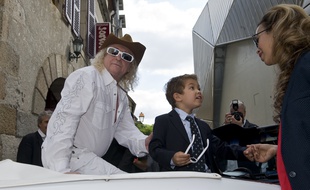 Michel Polnareff, son fils Louka et sa compagne Danyellah, le 20 juin 2015, à Montluçon (Allier).