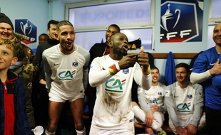 La joie des joueurs de Granville après leur victoire contre Bordeaux en 32e de finale de Coupe de France, le 7 janvier 2018.