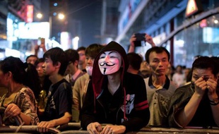 Des manifestants prodémocratie le 19 octobre 2014 dans le quartie Mongkok à Hong Kong