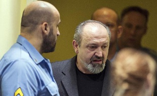 L'ancien lieutenant-colonel Vujadin Popovic, 57 ans, comparait le 30 janvier 2015 devant le Tribunal pénal international pour l'ex-Yougoslavie
