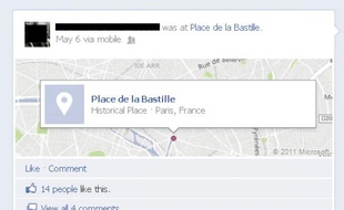 Un utilisateur de Facebook utilise le «check-in» le 6 mai 2012, après l'annonce des résultats.