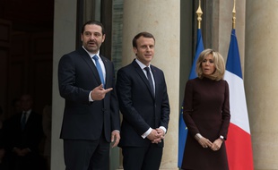 Saad Hariri, Emmanuel Macron et Brigitte Macron sur le perron de l'Elysée le 18 novembre 2017, à Paris.