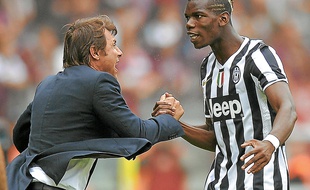 Antonio Conte (ici avec le Français Paul Pogba) a déjà gagné deux Scudetti avec la Juventus Turin.