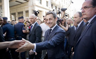 Nicolas Sarkozy devant le siège de l'UMP lundi 8 juillet 2013