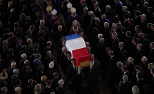 The coffin of late French President Jacques Chirac is carried out of Saint Sulpice church after his final service Monday, Sept. 30, 2019 in Paris. Former French President Jacques Chirac was given full military honors on Monday as past and current world leaders gathered in Paris to attend his final service.