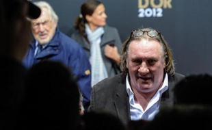 L'acteur Gérard Depardieu était absent mardi à sa convocation au palais de justice de Paris pour conduite de son scooter en état d'ivresse fin novembre, a constaté une journaliste de l'AFP.