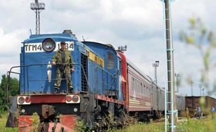 Le train transportant les corps des victimes du crash du vol MH17 à Kharkiv en Ukraine, le 22 juillet 2014