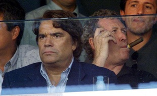 Le 8 septembre 2001, Bernard Tapie et Robert-Louis Dreyfus assistent à un match de l'OM au Vélodrome.