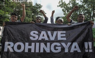Des réfugiés de la minorité rohingya résidant en Malaisie manifestent en faveur de leur communauté devant l'ambassade de Birmanie à Kuala Lumpur le 21 mai 2015