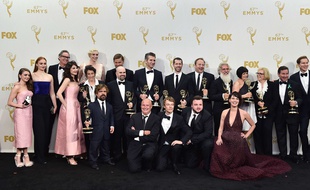 The cast and crew of "Game of Thrones", winners of the award for outstanding drama series, pose in the press room at the 67th Primetime Emmy Awards on Sunday, Sept. 20, 2015, at the Microsoft Theater in Los Angeles. (Photo by Jordan Strauss/Invision/AP)/CARA166/90056295592/092015112041/1509210707