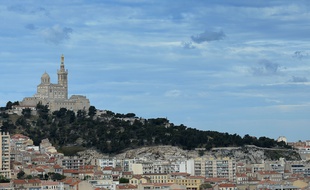 This photo taken on April 23, 2016 shows a view of the Notre-Dame de la Garde church in Marseille. / AFP PHOTO / BORIS HORVAT