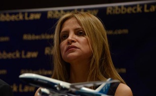 Monica Kelly, du cabinet d'avocats Ribbeck Law, lors d'un point presse à Kuala Lumpur le 26 mars 2014