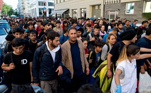 Des migrants arrivés à la gare de Munich, en Allemagne, le 12 septembre 2015.
