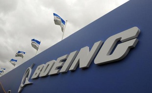 Le constructeur aéronautique américain Boeing a amélioré son bénéfice net de 18% à 4,6 milliards de dollars en 2013 malgré les problèmes liés à son dernier-né, le 787, mais il a livré mercredi des prévisions décevantes pour cette année.