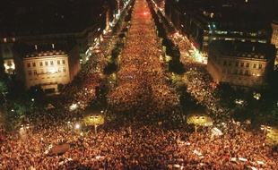 The view from the Arc de Triomphe looking along the Champs Elysees, in Paris in the early hours of Monday July 13 1998. Crowds gathered to celebrate the 3-0 victory of the French soccer team over Brazil in the final of the World Cup soccer championship played Sunday, July 12 1998 at the Stade de France, north of Paris.
