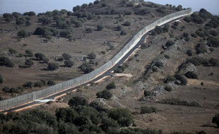 La ligne de séparation entre la partie syrienne du Golan et la partie occupée par Israël près de Quneitra, le 30 août 2014.