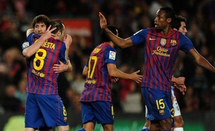 Le FC Barcelone s'est imposé 4-1 devant Malaga mercredi grâce notamment à trois buts de Lionel Messi et ne comptent plus que quatre points de retard sur le Real Madrid qui sera, malgré tout, sacré champion d'Espagne en cas de victoire sur le terrain de l'Athletic Bilbao.