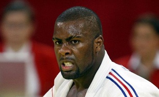 France's Teddy Riner reacts after defeating Russia's Alexander Mikhaylin in their over 100kg final at the Paris International grand slam judo tournament February 8, 2009. REUTER/Charles Platiau (FRANCE)