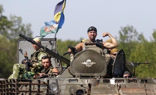 Des soldats ukrainiens dans un blindé dans la région de Donetsk, le 9 août 2014