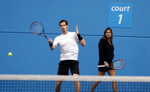 Britain's Andy Murray, left, is watched by his coach Amelie Mauresmo during a training session ahead of his third round match at the Australian Open tennis championships in Melbourne, Australia, Friday, Jan. 22, 2016.(AP Photo/Rafiq Maqbool)/XMEL169/729781480960/1601220425