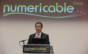 Le PDG de Numericable Eric Denoyer lors de la conférence de presse du groupe à Paris le 12 mars 2014