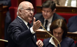 Le ministre des Finances Michel Sapin, lors d'une séance de questions au gouvernement, à l'Assemblée nationale à Paris, le 30 mars 2016