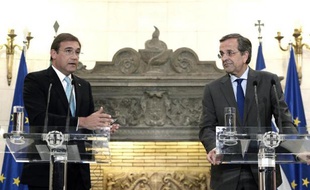 Le Premier ministre grec Antonis Samaras (d) et son homologue portugais Pedro Passos Coelho à Athènes le 9 septembre 2014