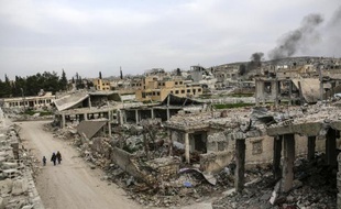 Ruines d'un quartier de la ville syrienne de Kobane, le 27 mars 2015