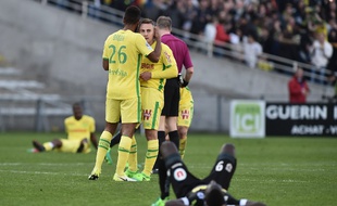 Koffi Djidji et Valentin Rongier à la fin du match.
