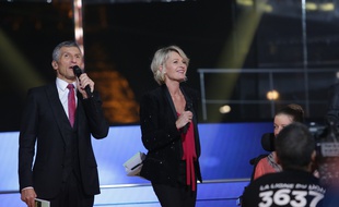 Nagui et Sophie Davant lors du Téléthon 2014.