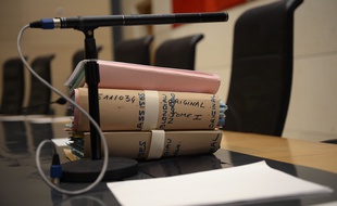 A picture taken on January 29, 2015 shows folders during the appeal trial of Nicolas Blondiau at Avignon's courthouse. Blondiau was sentenced in 2013 to life imprisonment without parole for the rape and murder of Oceane, a eight-year-old girl, in November 2011 in Bellegarde, southeastern France. AFP PHOTO / BORIS HORVAT
