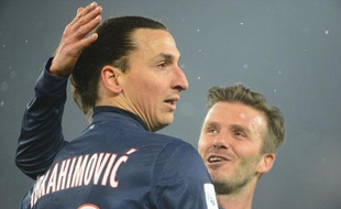 Les joueurs du PSG, Zlatan Ibrahimovic (à g.) et david Beckham, lors d'un match de L1 contre l'OM le 24 février 2013.