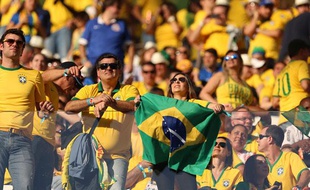 Des supporters brésiliens lors de la cérémonie d'ouverture à Sao Paulo, le 12 juin 2014.