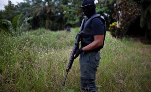 Quatorze personnes ont été tuées vendredi dans l'assaut mené par les forces malaisiennes pour mettre fin à plus de deux semaines d'occupation d'une région de l'île de Bornéo par des Philippins membres d'un groupe armé revendiquant la zone au nom d'un "sultanat".