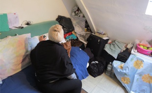 Une personne mal-logée à Paris.