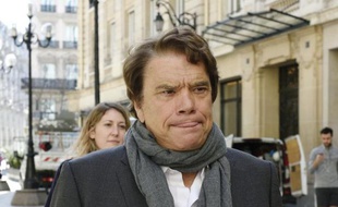 Bernard Tapie, le 15 mars 2015 à son arrivée au pôle financier à Paris