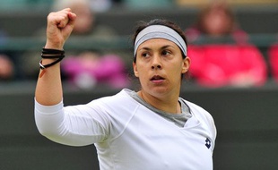 La Française Marion Bartoli lors de sa victoire contre Sloane Stephens le 2 juin 2013, en quart de finale de Wimbledon.