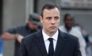 Oscar Pistorius arrive au tribunal de Pretoria, le 7 avril 2014