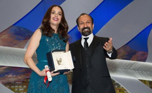 L'actrice franco-argentine Bérénice Bejo et le réalisateur iranien Asghar Farhadi, à Cannes, le 26 mai 2013. L'actrice avait reçu le prix d'interprétation féminine au festival de Cannes pour son rôle dans Le Passé.