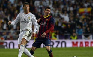 Les deux stars du football espagnol Cristiano Ronaldo et Lionel Messi, opposés dans le clasico Real Madrid-FC Barcelone, le 23 mars 2014 à Madrid