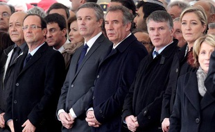 Les candidats à la présidentielle François Hollande, Nicolas Dupont-Aignan, François Bayrou et Marine Le Pen assistent, le 21 mars 2012, à Montauban, à la cérémonie en hommage aux trois parachutistes tués le jeudi 15 mars.