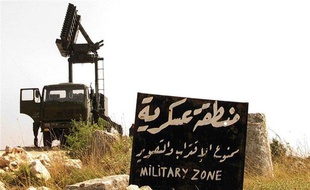 Un véhicule militaire près d'Alep, au nord de la Syrie, le 24 juin 2012.