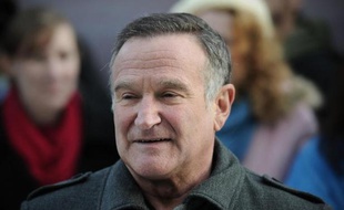 L'acteur Robin Williams, décédé le 11 août 2014, ici lors de la Première de "Happy Feet 2" à Londres le 20 novembre 2011