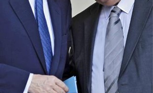 Brice Hortefeux (à g.) et Michel Mercier, lors d'une rencontre à l'Elysée en mars.