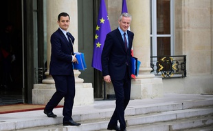 Bruno Le Maire et Gérald Darmanin à la sortie de l'Elysée le 12 juillet 2017.