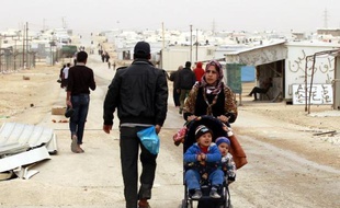 Des réfugiés syriens dans le camp de Zaatari près de la frontière syrienne le 8 mars 2014