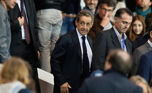 Nicolas Sarkozy à son arrivée le 21 septembre 2014 au Parc des Princes à Paris, après son intervention sur France 2
